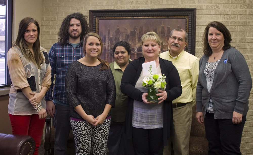 Community Partners' staff stopped by Lesley LaFile's office to thank her for her help securing the Catholic Health Initiatives Mission and Ministry grant for the Violence Prevention Coalition.