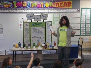 Activate Buffalo County Coordinator Holden Armstrong presents the ReThink Your Drink display to a class at Park Elementary.