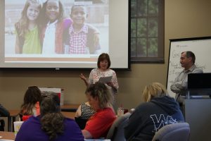 Carol Renner speaks to Kearney Public Schools teachers who are implementing the Second Step program in their classrooms.